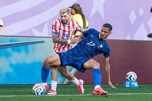 Julio Enciso William Saliba during France v Paraguay at the 2026 FIFA World Cup