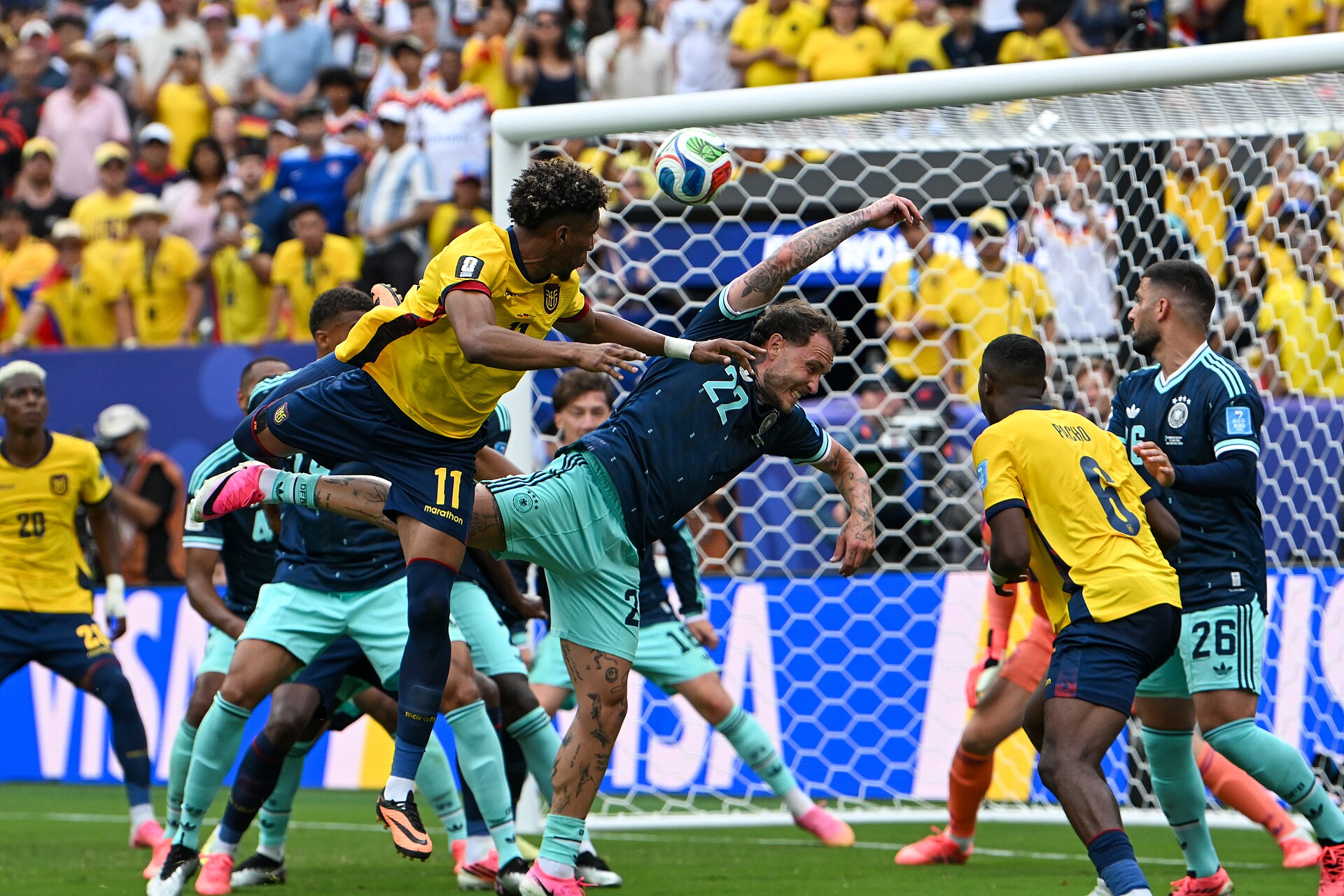 EAST RUTHERFORD, UNITED STATES - June 25: Kevin Rodriguez #11 of Ecuador battles in the air with Antonio Rudiger #2 of Germany during the FIFA World Cup 2026 Group E match between Ecuador  and  Germany on June 25, 2026 MetLife Stadium, East Rutherford, New Jersey