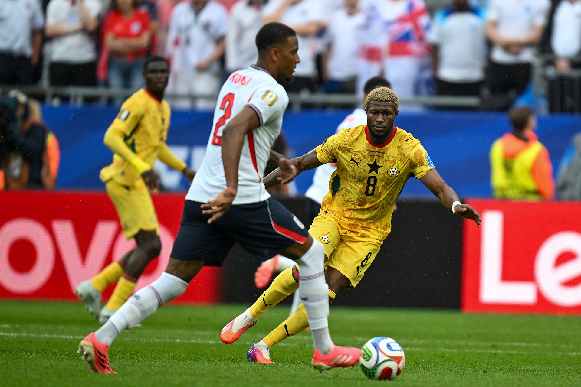 FOXBOROUGH, UNITED STATES - June 23: Ezri Konsa #2 of England is in action against Kwasi Sibo #8 of Ghana during the FIFA World Cup 2026 Group L match between England and Ghana on June 23, 2026 Boston Stadium , Foxborough, Massachusetts