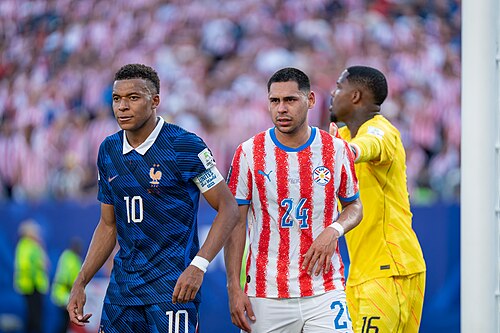 Kylian Mbappe Gustavo Caballero during France v Paraguay at the 2026 FIFA World Cup
