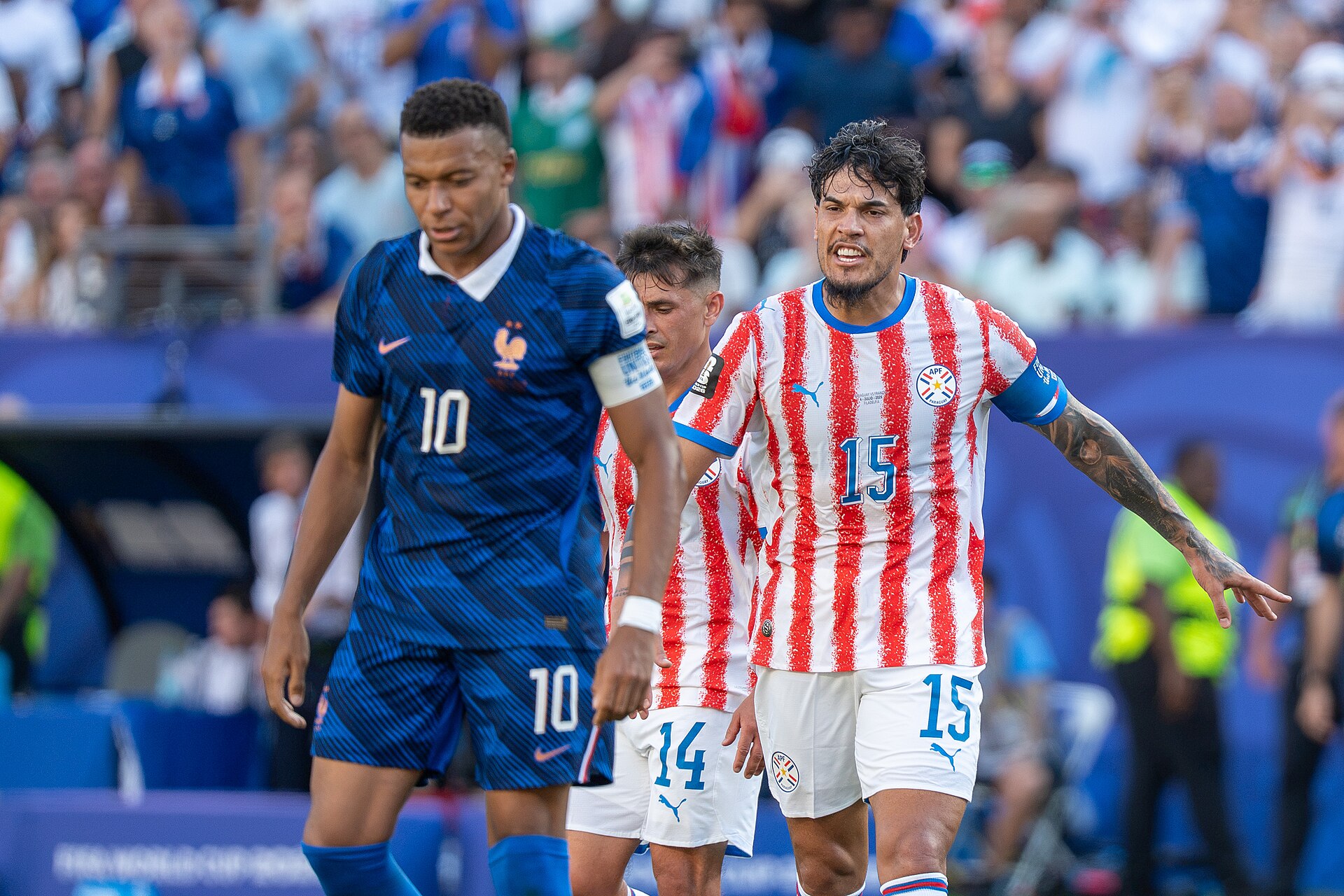 Kylian Mbappe Gustavo Gomez during France v Paraguay at the 2026 FIFA World Cup