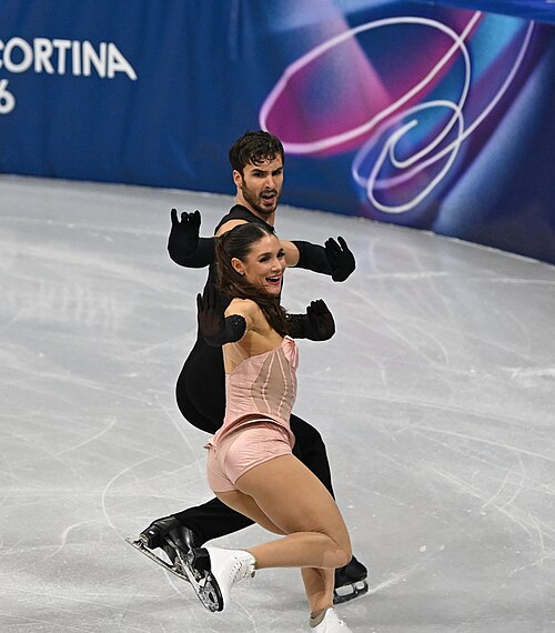 MILAN, ITALY - 09 FEBRUARY 2026: Laurence Fournier Beaudry and Guillaume Cizeron of France compete during the Figureskating ice dance rhythm dance at the Olympic Winter Games Milano Cortina 2026 Milano Ice Skating Arena on February 09, 2026 in Milan, Italy