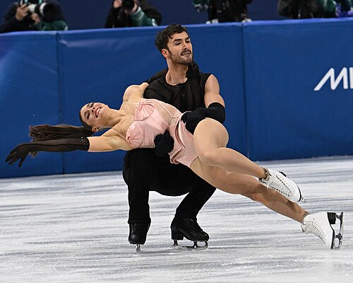 MILAN, ITALY - 06 FEBRUARY 2026: Laurence Fournier Beaudry and Guillaume Cizeron of France compete during the  Ice Dance Rhythm Dance Team Event  at the Milano Ice Skating Arena at the Olympic Winter Games Milano Cortina 2026  on February 06, 2026 in ,