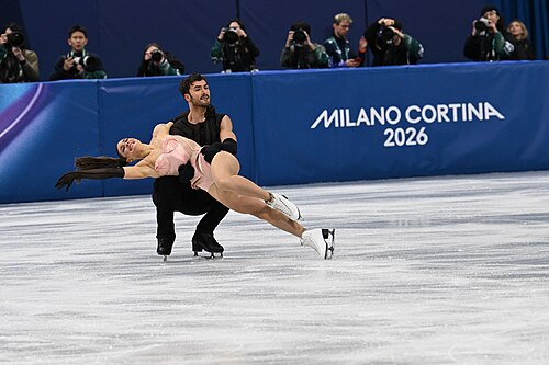 MILAN, ITALY - 06 FEBRUARY 2026: Laurence Fournier Beaudry and Guillaume Cizeron of France compete during the  Ice Dance Rhythm Dance Team Event  at the Milano Ice Skating Arena at the Olympic Winter Games Milano Cortina 2026  on February 06, 2026 in ,