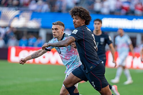 Leandro Trossard Chris Richards during Belgium v United States at the 2026 FIFA World Cup