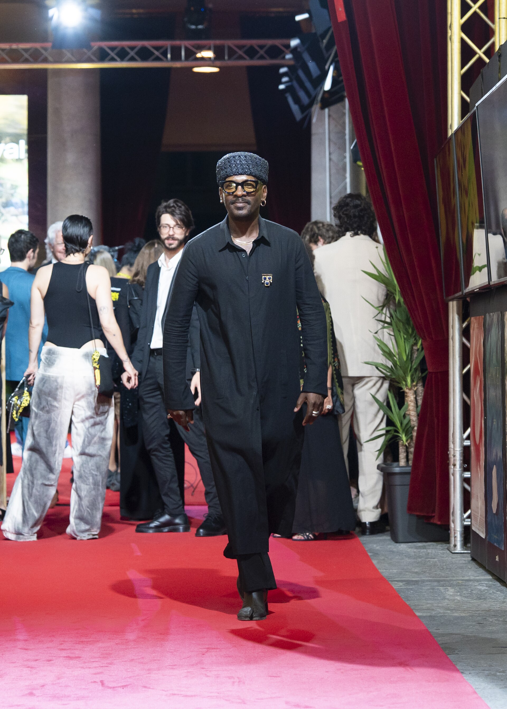 Director Lemohang Mosese leaving the red carpet on 6th August at the 78th Locarno Film Festival
