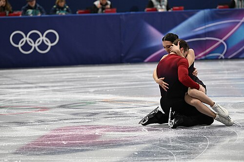 MILAN, ITALY - 06 FEBRUARY 2026: Lia Pereira and Trennt Michaud of Canada compete during the Figure Skating Team Event Pair Skating Short Program at the Olympic Winter Games Milano Cortina 2026  Milano Ice Skating Arena on February 06, 2026 in Milan, Italy