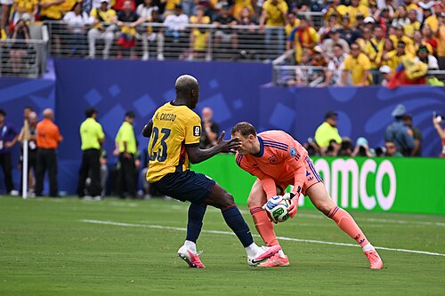 EAST RUTHERFORD, UNITED STATES - June 25: Moises Caicedo #23 of Ecuador is in action against Goalkeeper Manuel Neuer #1 during the FIFA World Cup 2026 Group E match between Ecuador  and  Germany on June 25, 2026 MetLife Stadium, East Rutherford, New Jersey