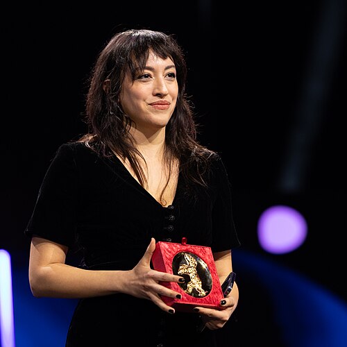 Director Marie-Rose Osta with the Golden Bear for Best Short Film at the award ceremony of the 2026 Berlin International Film Festival