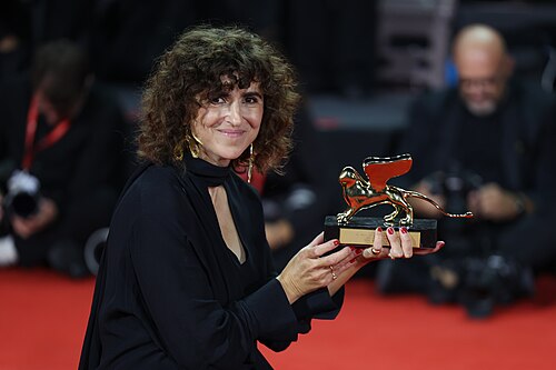 May el-Toukhy with the Golden Lion for "Woman Unknown" at Venice Film Festival 83