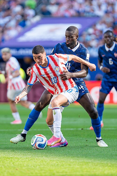 Miguel Almiron Dayot Upamecano during France v Paraguay at the 2026 FIFA World Cup