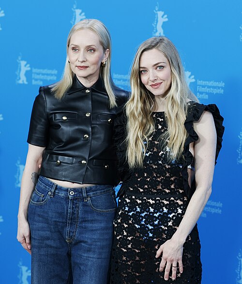Amanda Seyfried and Mona Fastvold pose at a photocall for "The Testament Of Ann Lee" at Berlinale 2026 in Berlin, Germany