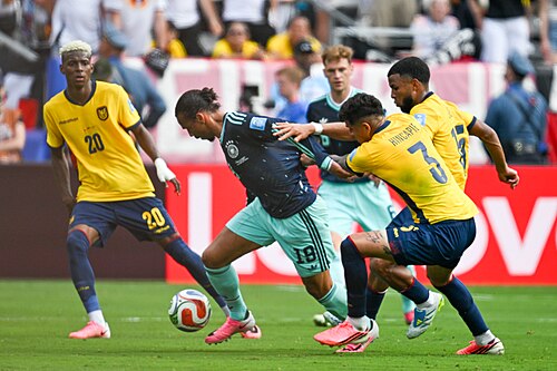 EAST RUTHERFORD, UNITED STATES - June 25: Nathaniel Brown #18 of Germany battles for possession with Piero Hincapie #3 of Ecuador during the FIFA World Cup 2026 Group E match between Ecuador  and  Germany on June 25, 2026 MetLife Stadium, East Rutherford, New Jersey