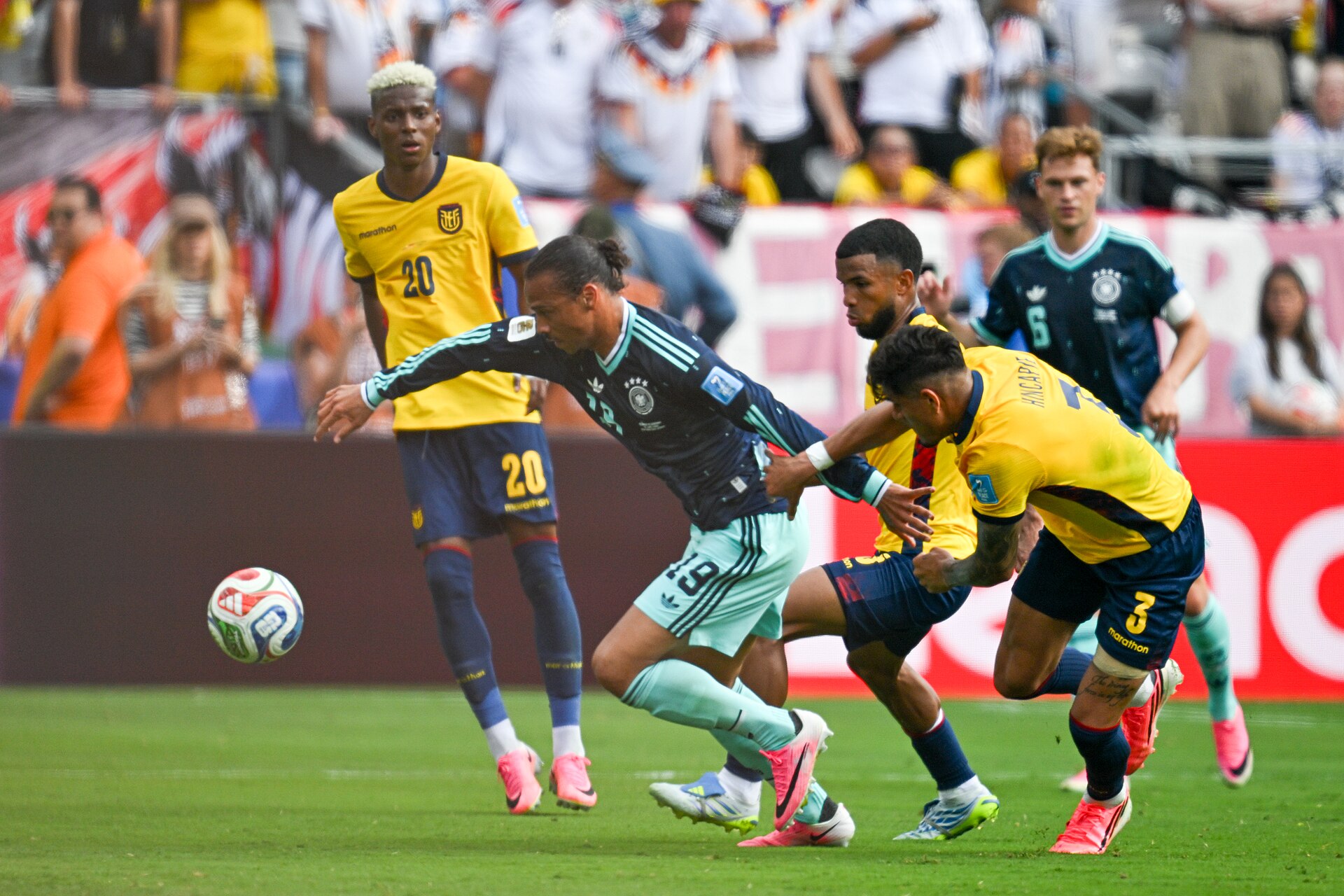 EAST RUTHERFORD, UNITED STATES - June 25: Nathaniel Brown #18 of Germany battles for possession with Piero Hincapie #3 of Ecuador during the FIFA World Cup 2026 Group E match between Ecuador  and  Germany on June 25, 2026 MetLife Stadium, East Rutherford, New Jersey