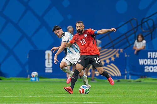 Nicolas Tagliafico Mohamed Salah during Argentina v Egypt at the 2026 FIFA World Cup