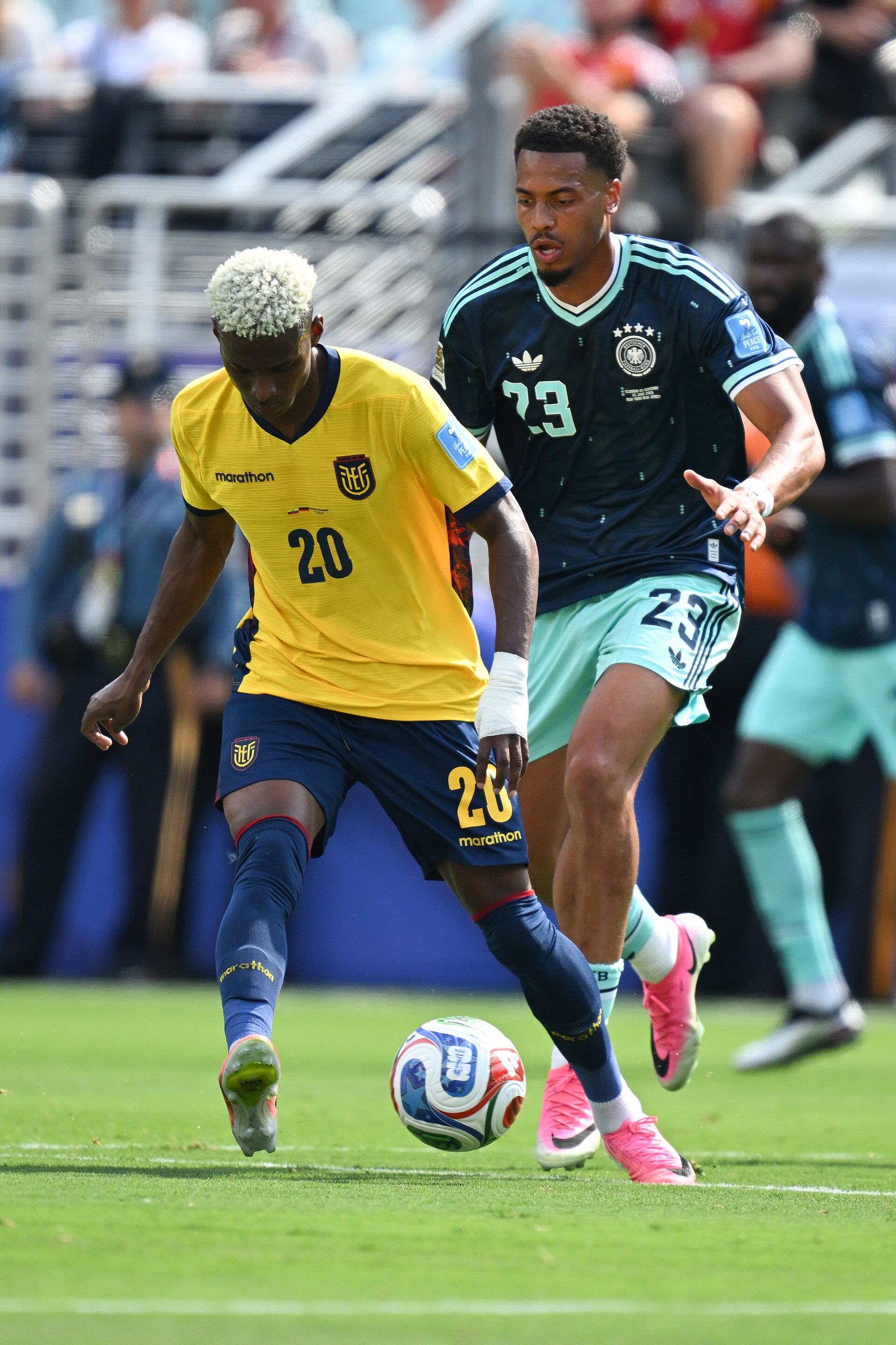 EAST RUTHERFORD, UNITED STATES - June 25: Nilson Angulo #20 of Ecuador battles for possession with Felix Nmecha #23 of Germany during the FIFA World Cup 2026 Group E match between Ecuador  and  Germany on June 25, 2026 MetLife Stadium, East Rutherford, New Jersey