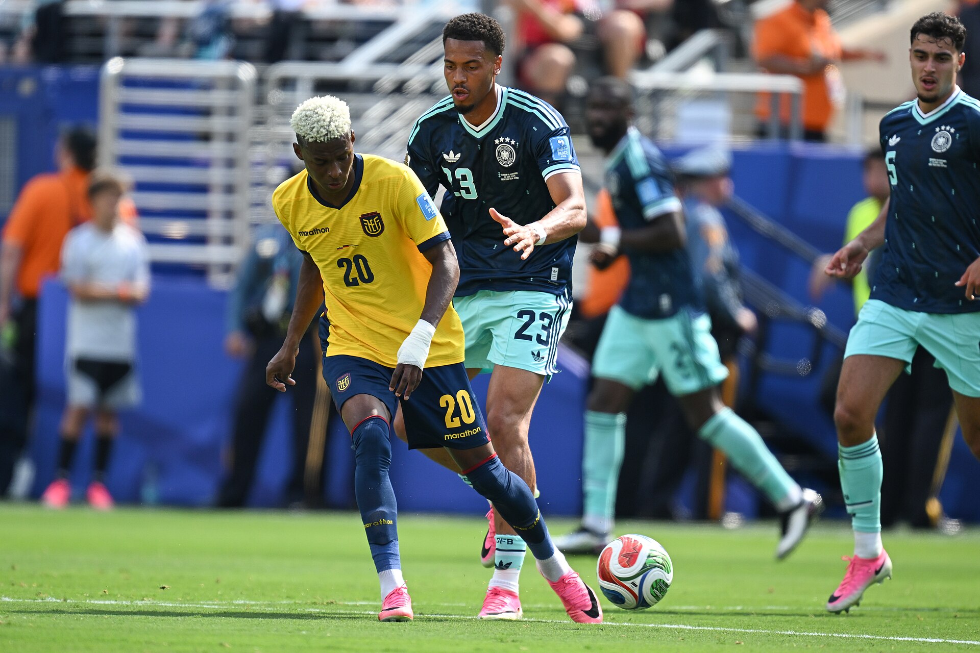 EAST RUTHERFORD, UNITED STATES - June 25: Nilson Angulo #20 of Ecuador battles for possession with Felix Nmecha #23 of Germany during the FIFA World Cup 2026 Group E match between Ecuador  and  Germany on June 25, 2026 MetLife Stadium, East Rutherford, New Jersey