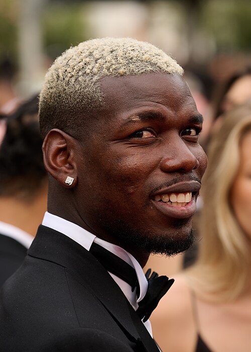 Paul Pogba attends the premiere for "Highest 2 Lowest" at the 2025 Cannes Film Festival, wearing earrings from his first jewellery co-collection, Elke Berr × Paul Pogba – Unbreakable