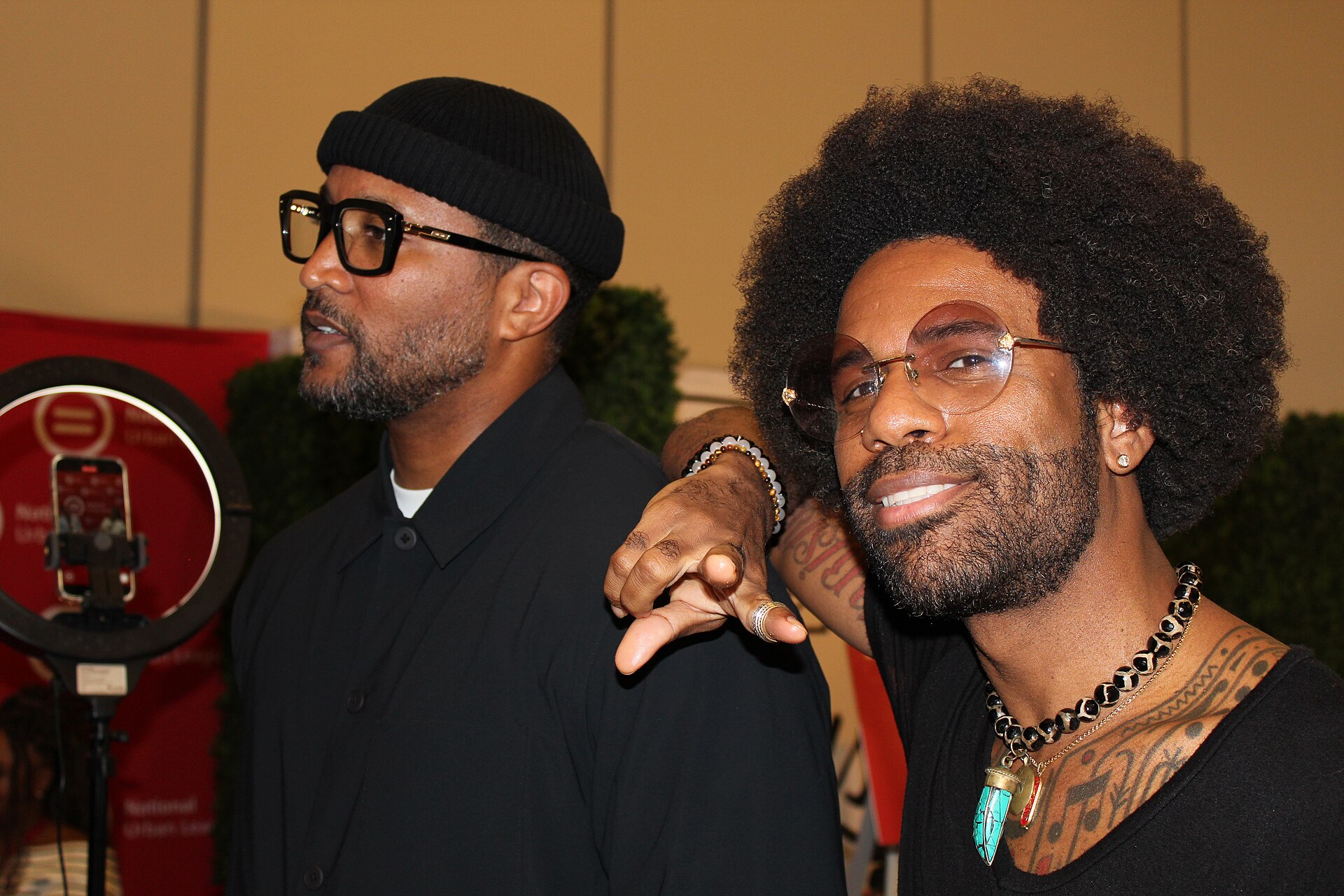 Ramses Ja, Host Civic Cipher and the QR Code an iHeartRadio syndicate, with co-host  Q-Ward at the 2025 National Urban League Conference.