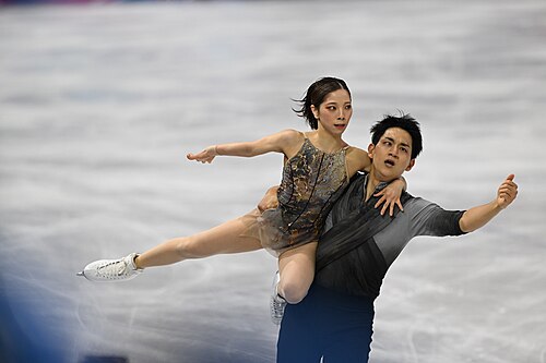 MILAN, ITALY - 16 FEBRUARY 2026: Riku MIURA and Ryuichi KIHARA of Japan compete during the Figure Skating Pair Skating Free Skating at the Olympic Winter Games Milano Cortina 2026 Milano Ice Skating Arena on February 16, 2026 in Milan, Italy