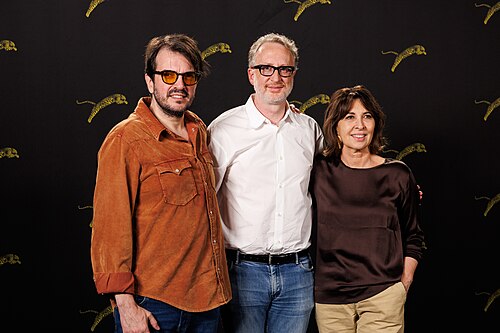 Rodrigo Teixeira, director James Gray and Raffaella Leone attend "Paper Tiger" photocall during the 79th Locarno Film Festival on August 09, 2026 in Locarno, Switzerland.