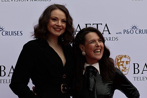 Rosie Jones & Guest at the TV BAFTA red carpet, May 26