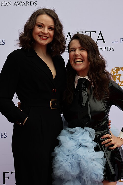 Rosie Jones & Guest at the TV BAFTA red carpet, May 26