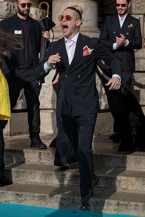 Satoshi representing Moldova on the Turquoise Carpet at the 2026 Eurovision Song Contest in Vienna