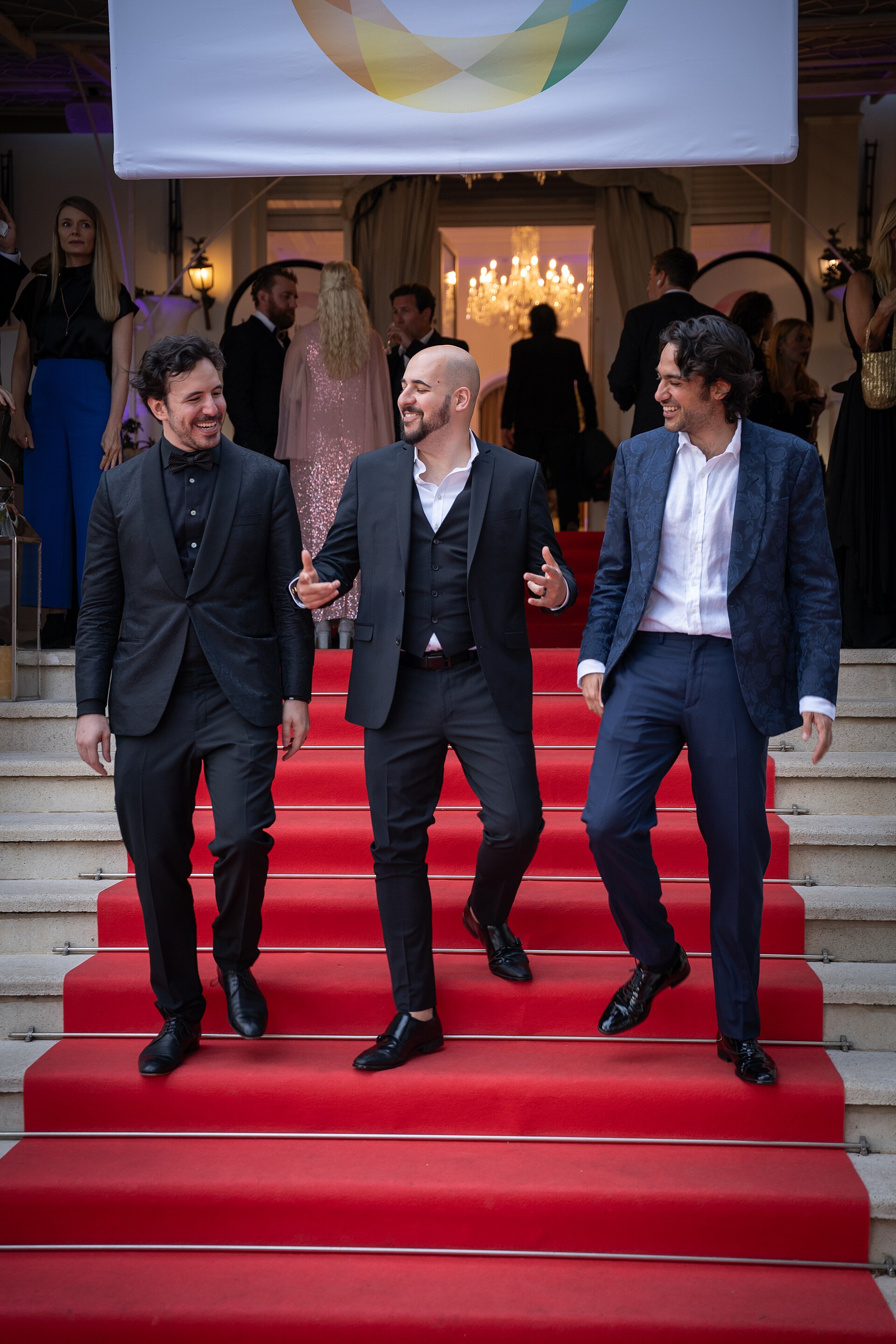 Scott Aharoni, Alihan Yalcindag and Sinan Eozacibasi, producers, at a Cannes Film Festival party red carpet in Cannes, France in May 2025.