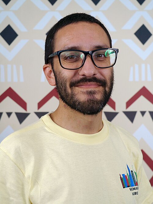 Sebastián Flores portrait at Wikimania 2025 WikiPortraits Studio