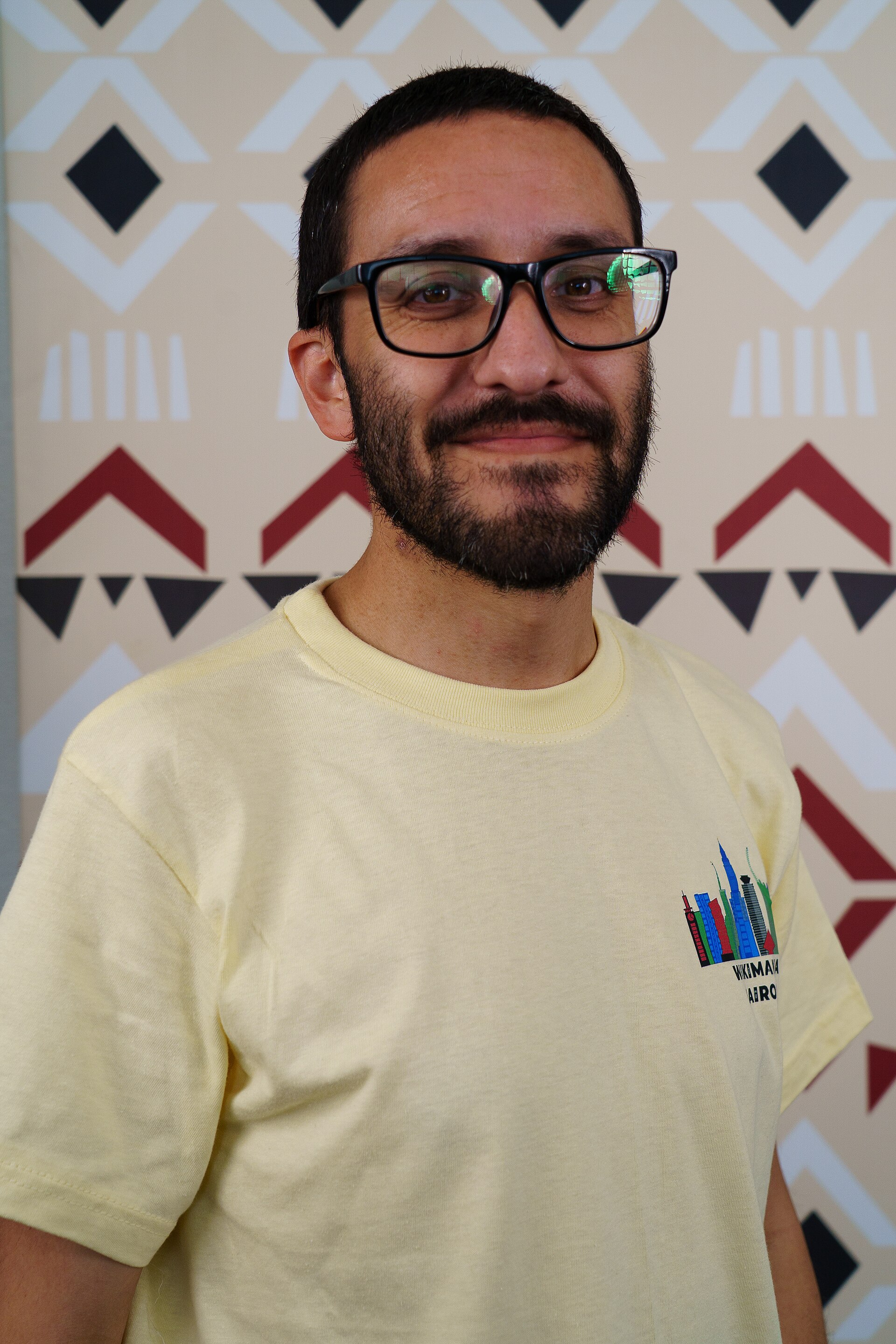 Sebastián Flores portrait at Wikimania 2025 WikiPortraits Studio