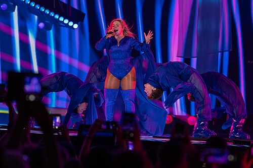 Sissal, representing Denmark, performing at Eurovision 2025 in Basel, Switzerland.