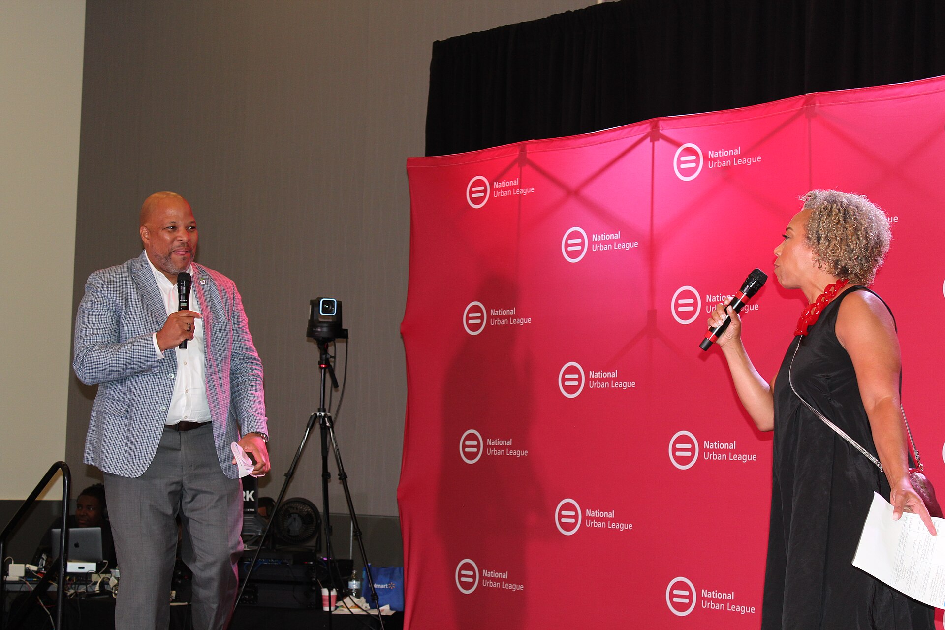 Hosts Kenneth L. Johnson and Jodi Brockington introducing the Speed Networking Reception hosted by Ceasar's.