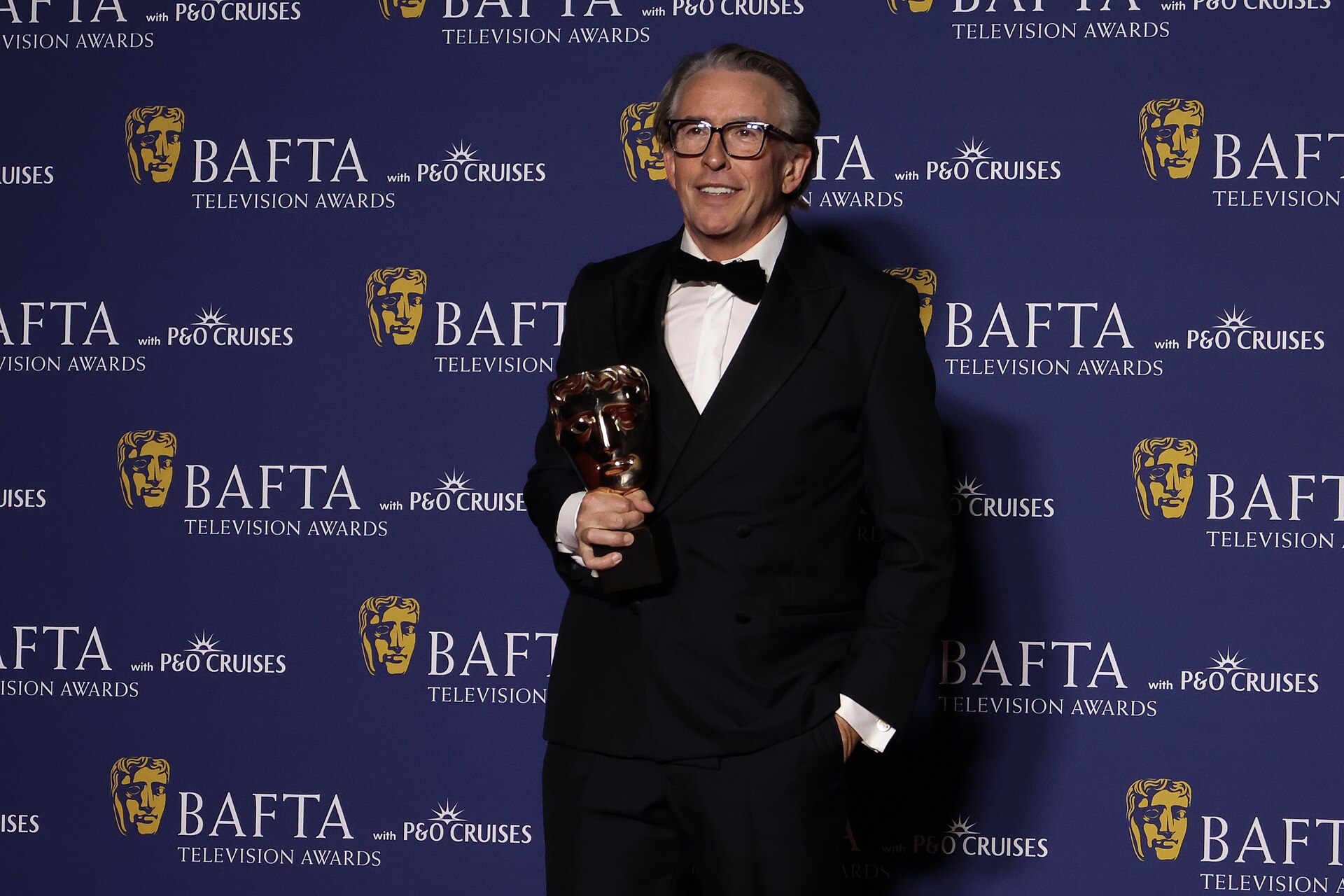 Steve Coogan winning Actor in a Comedy at BAFTA TV Awards May 26