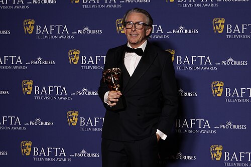Steve Coogan winning Actor in a Comedy at BAFTA TV Awards May 26