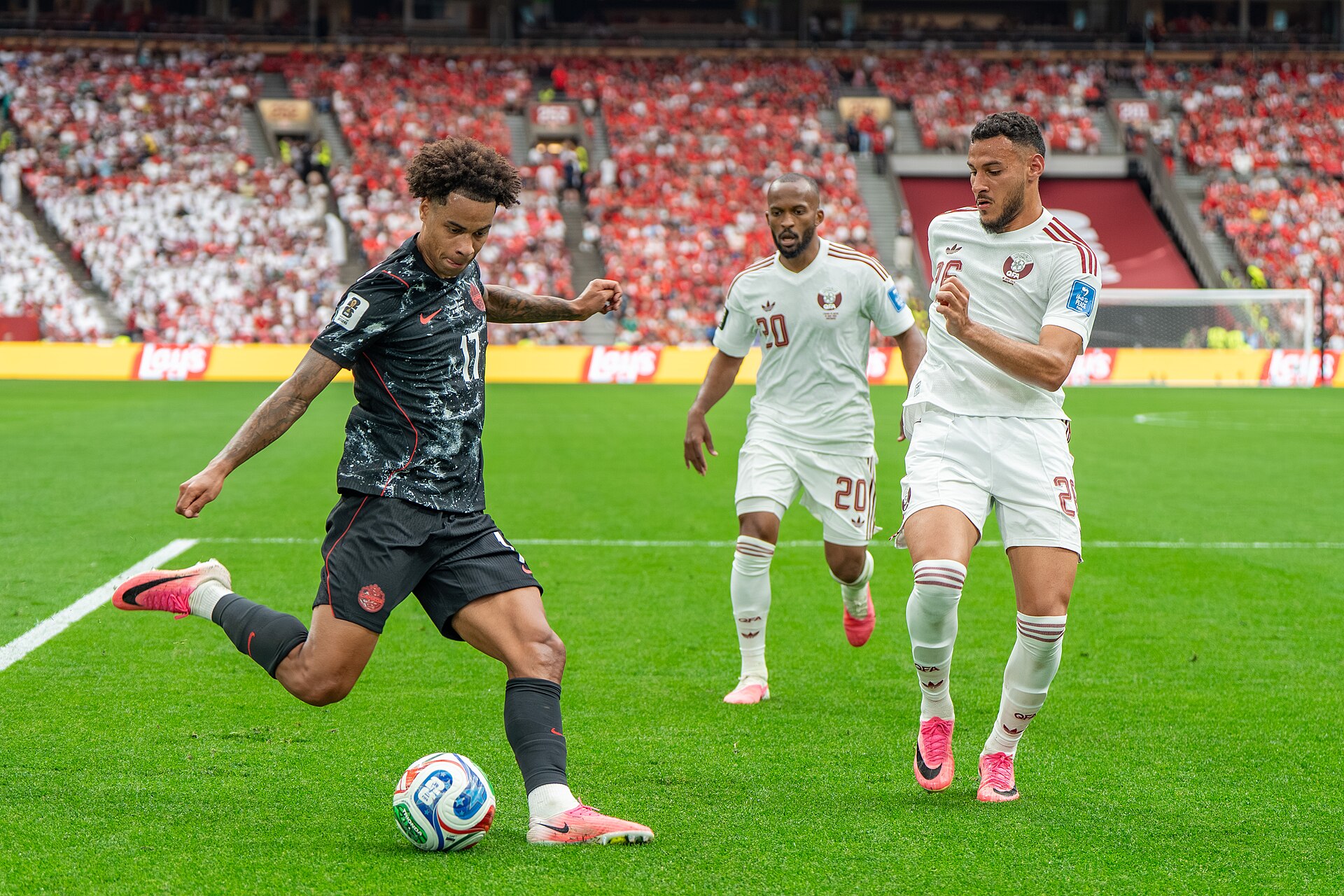 Tajon Buchanan Ahmed Fathy Mohamed Manai during Canada v Qatar on 18 June 2026 at the 2026 FIFA World Cup