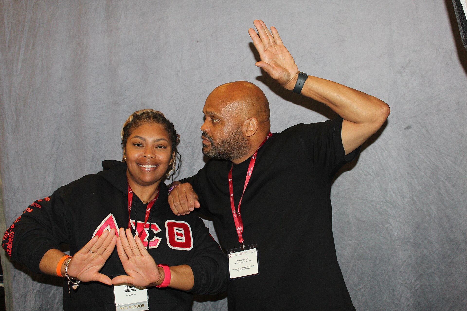 Tamika Williams and Alvin Smith, owner of The Urban Design Suite, posing for a pic inbetween taking headshots for patrons, at the 2025 National Urban League Conference.