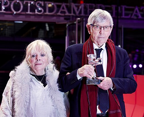 Tom Courtenay and Anna Calder-Marshall poses with tthe Silver Bear for Best Supporting Performance for “Queen at Sea” on the red carpet after the Award Ceremony of Berlinale 2026 in Berlin, Germany