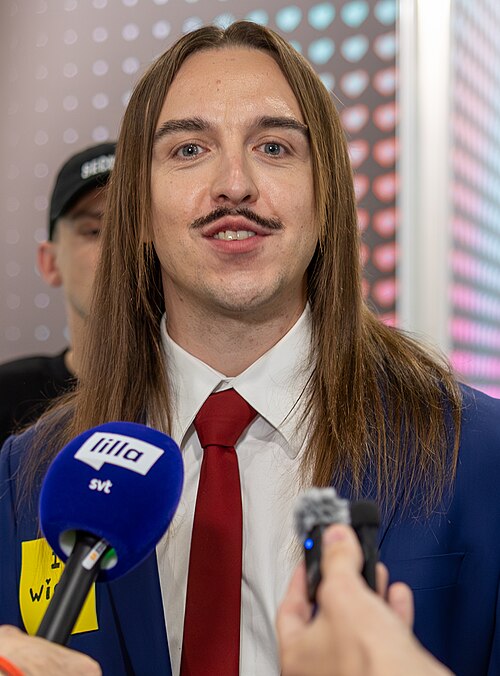 Tommy Cash, representing Estonia, being interviewed at Eurovision 2025 in Basel, Switzerland.
