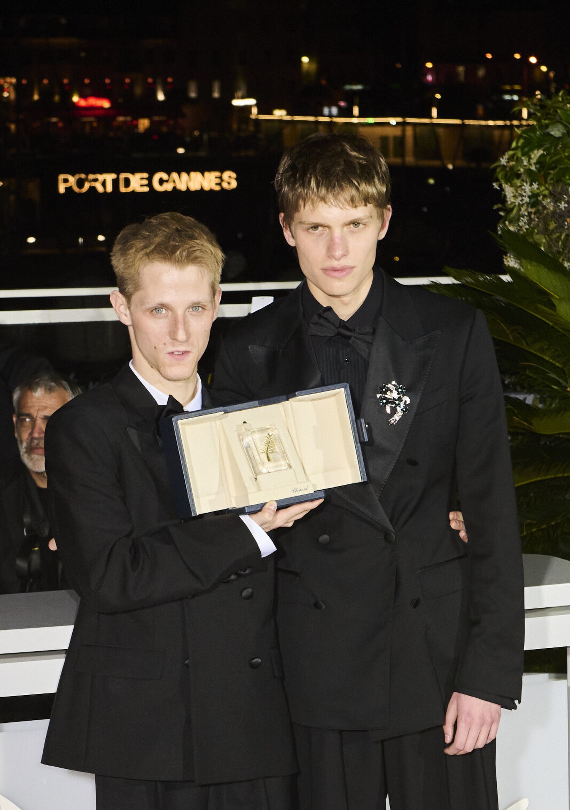 Valentin Campagne and Emmanuel Macchia pose with the Best Actor award for "Coward" during the Palme D'Or winners photocall at the 79th annual Cannes Film Festival