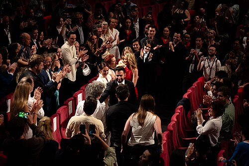 Liz Siegal, Ruth Wilson, Zachary Wigon, Maika Monroe, Evie Templeton and Virigina Feito during the standing ovation for Victorian Psycho at the 2026 Cannes Film Festival.