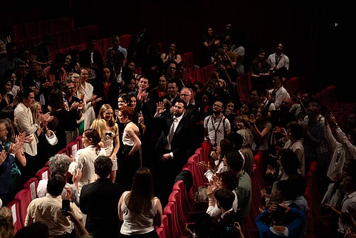 Liz Siegal, Ruth Wilson, Zachary Wigon, Maika Monroe, Evie Templeton and Virigina Feito during the standing ovation for Victorian Psycho at the 2026 Cannes Film Festival.