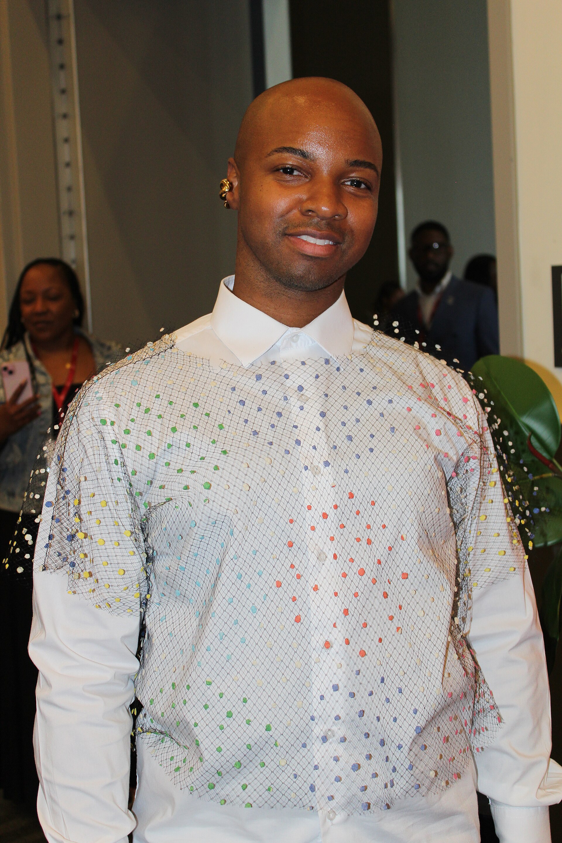 Vincent Tobias, Global Travel Hair and Makeup Artist for Staff and Talent, beating faces at the 2025 National Urban League Conference.