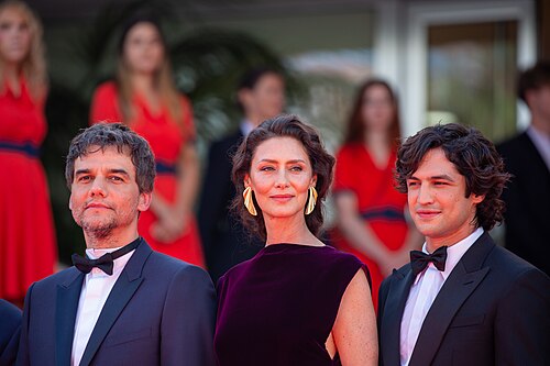 Wagner Moura, Maria Fernanda Cândido, and Gabriel Leone at 2025 Cannes Red Carpet for O Agente Secreto