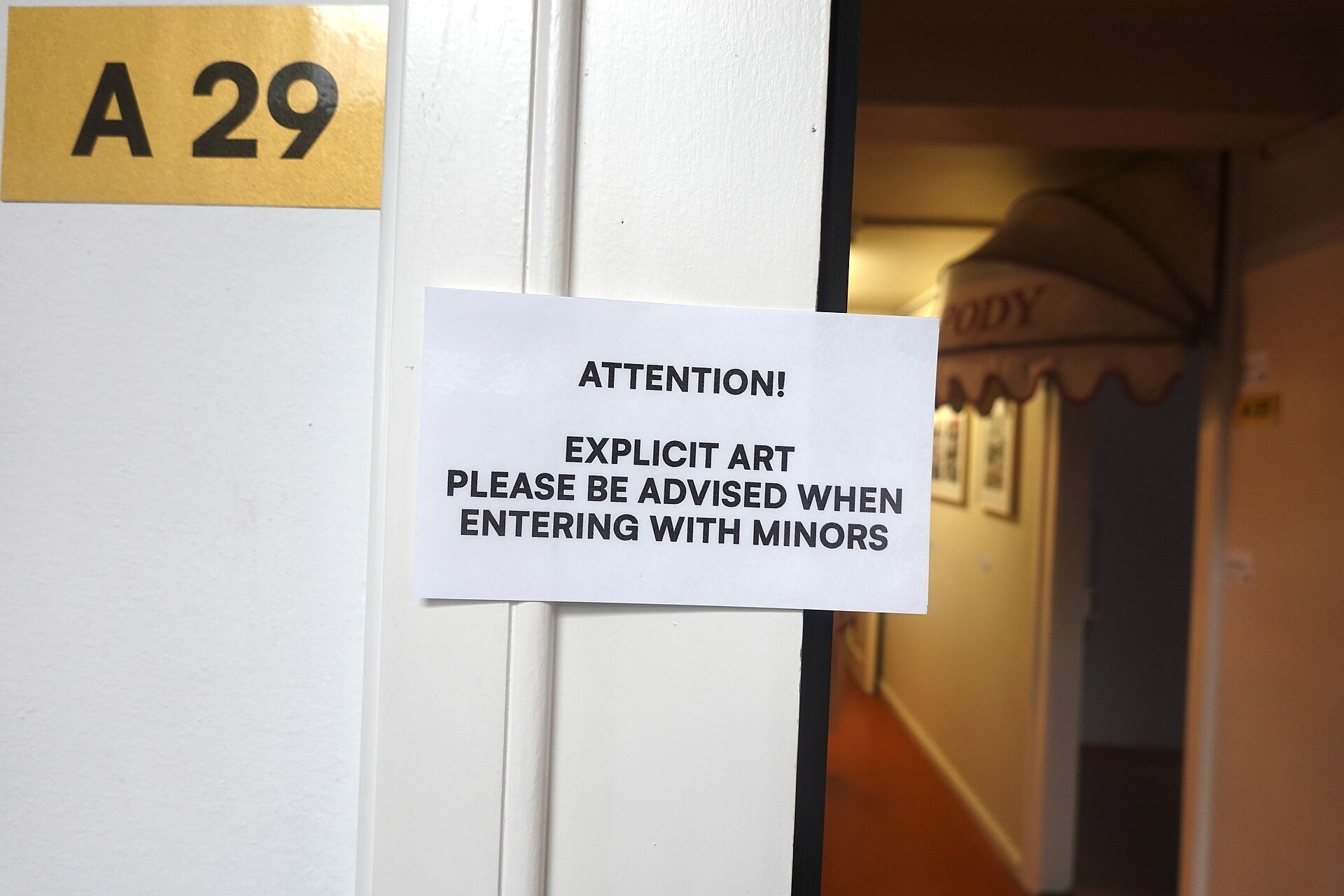 Explicit Art Content Warning Sign at Basel Social Club at Art Basel 2025 09