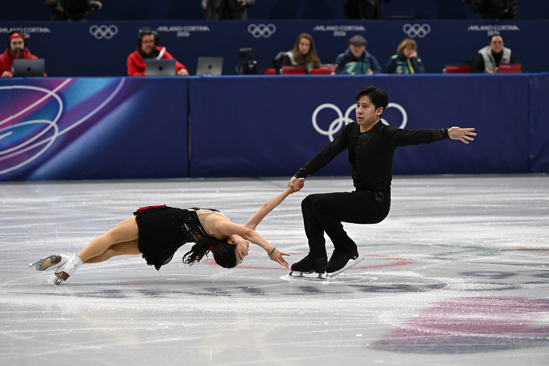 MILAN, ITALY - 06 FEBRUARY 2026: Wenjing Sui and Cong Han of China compete during the Figure Skating Team Event Pair Skating Short Program at the Olympic Winter Games Milano Cortina 2026  Milano Ice Skating Arena on February 06, 2026 in Milan, Italy