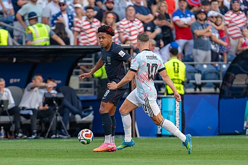 Weston McKennie Leandro Trossard during Belgium v United States at the 2026 FIFA World Cup