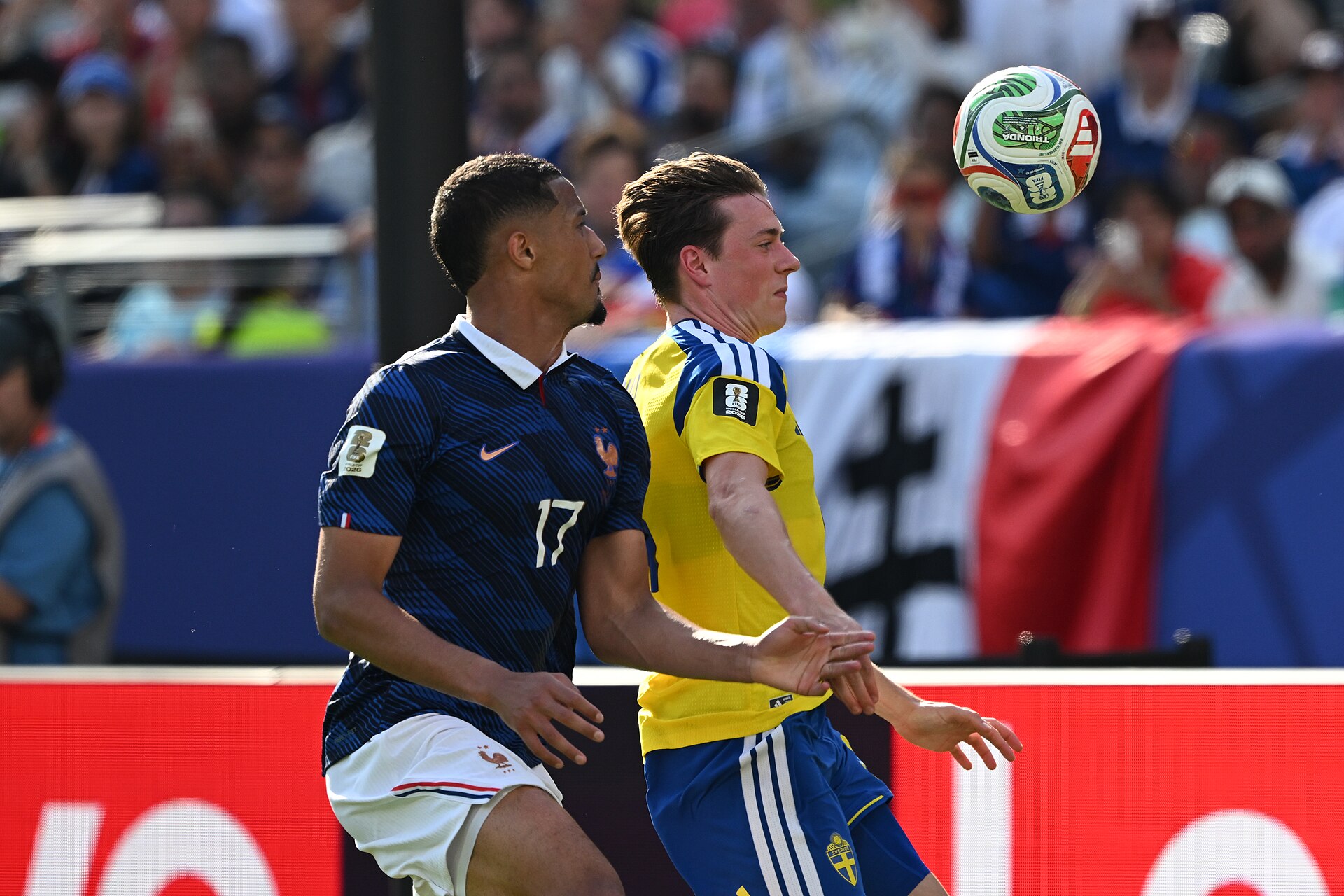 EAST RUTHERFORD, UNITED STATES - June 30: William Saliba #17 is in action against Elliot Stroud #24 of Sweden during the FIFA World Cup 2026 round of 32 match between France  and Sweden on June 30, 2026 MetLife Stadium, East Rutherford, New Jersey
