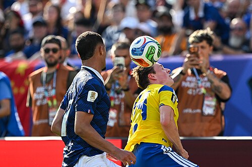EAST RUTHERFORD, UNITED STATES - June 30: William Saliba #17 is in action against Elliot Stroud #24 of Sweden during the FIFA World Cup 2026 round of 32 match between France  and Sweden on June 30, 2026 MetLife Stadium, East Rutherford, New Jersey