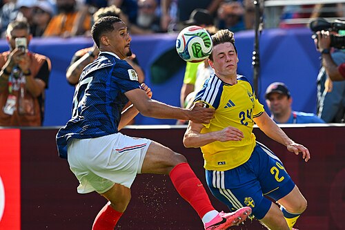 EAST RUTHERFORD, UNITED STATES - June 30: William Saliba #17 is in action against Elliot Stroud #24 of Sweden during the FIFA World Cup 2026 round of 32 match between France  and Sweden on June 30, 2026 MetLife Stadium, East Rutherford, New Jersey